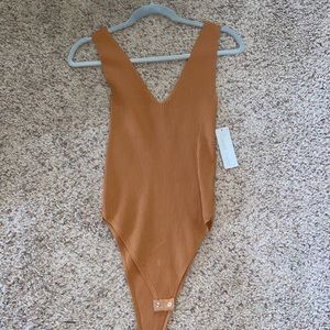 Lizard thicket rubbed body suit